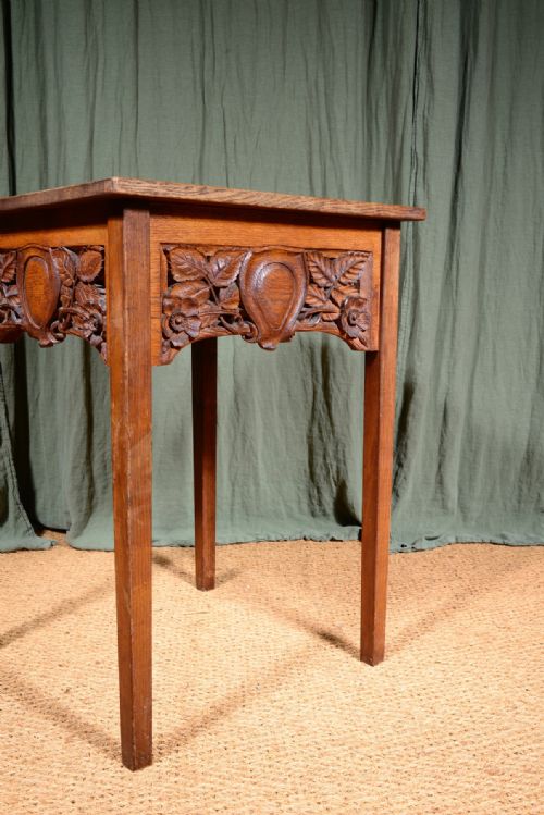 A VICTORIAN OAK TABLE WITH CARVED DECORATION C1860 - ADDITIONAL PHOTO 4