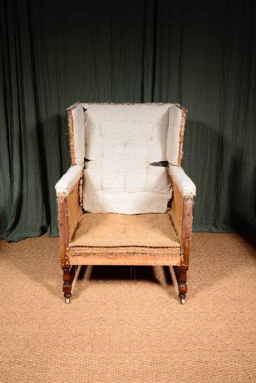 AN EDWARDIAN MAHOGANY ANGULAR WINGBACK ARMCHAIR STRIPPED FOR REUPHOLSTERY C1910 - ADDITIONAL PHOTO 5