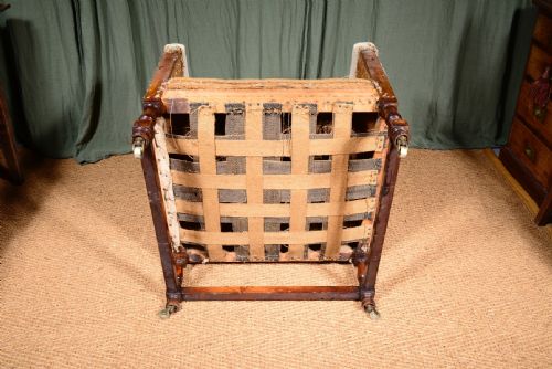 AN EDWARDIAN MAHOGANY ANGULAR WINGBACK ARMCHAIR STRIPPED FOR REUPHOLSTERY C1910 - ADDITIONAL PHOTO 7