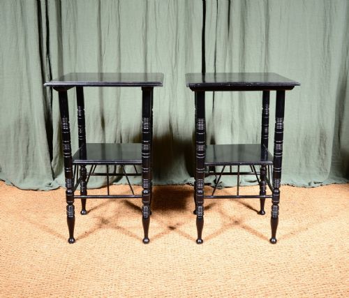 A PAIR OF AESTHETIC MOVEMENT EBONISED TWO TIER TABLES TO A DESIGN BY EW GODWIN C1870 - ADDITIONAL PHOTO 1