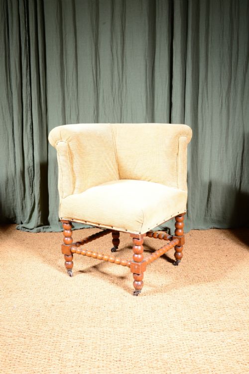 a golden oak corner chair on bobbin turned legs c1890 - CATEGORY: ANTIQUE CHAIRS - DATED 1890