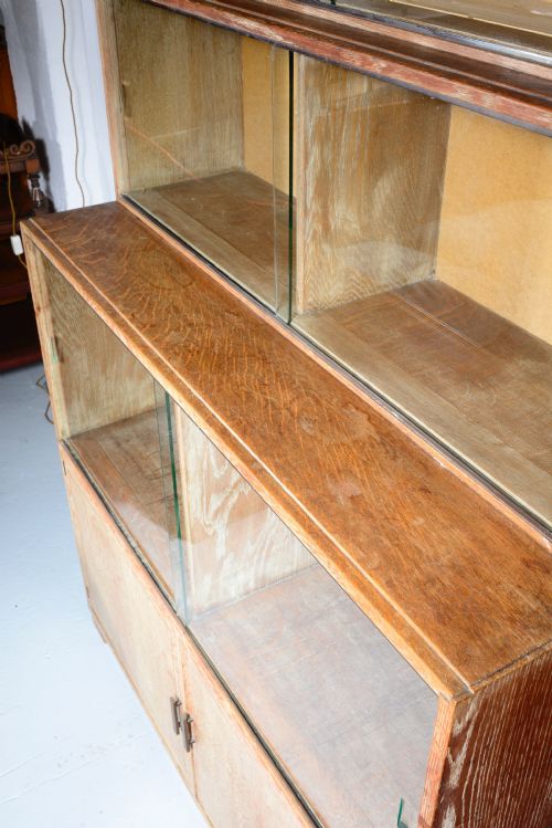 A LIMED OAK GLAZED SECTIONAL LIBRARY BOOKCASE BY MINTY OF OXFORD C1930 - ADDITIONAL PHOTO 5