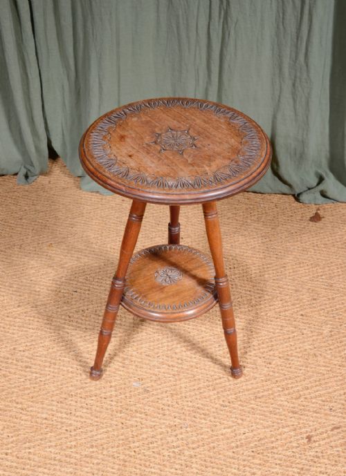 an aesthetic movement oak and mahogany tripod table with chip carved decoration c1900 - CATEGORY: ANTIQUE TABLES - DATED 1900