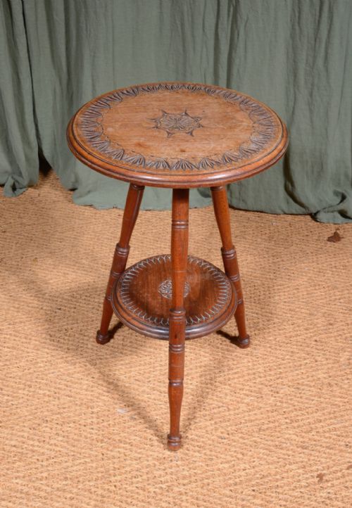 AN AESTHETIC MOVEMENT OAK AND MAHOGANY TRIPOD TABLE WITH CHIP CARVED DECORATION C1900 - ADDITIONAL PHOTO 1