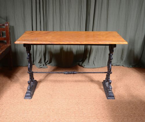 A VICTORIAN CAST IRON PUB TABLE WITH A SATIN BIRCH TOP C1890 - ADDITIONAL PHOTO 1