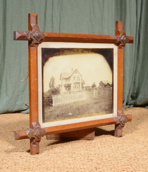 a 19th century sepia photograph of an american family outside their home in a gothic tramp art frame c1880 - CATEGORY: ANTIQUE MISCELLANEOUS - DATED 19TH CENTURY