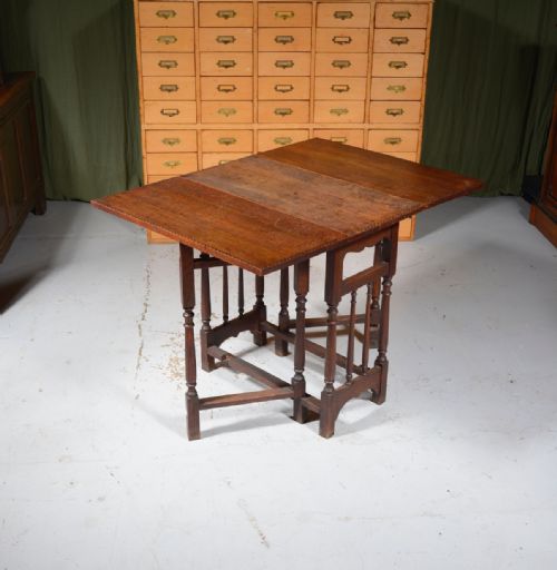 AN OAK ARTS AND CRAFTS DROP LEAF TABLE C1870 - ADDITIONAL PHOTO 1