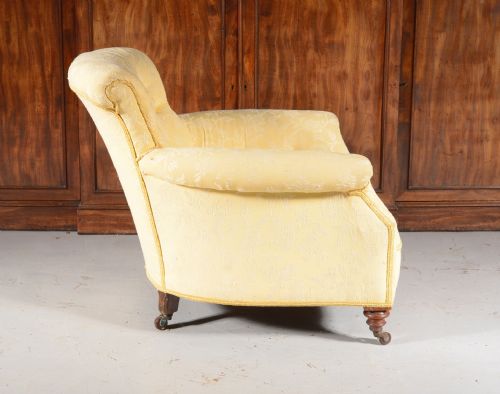 A HOWARD SONS 'WOODSTOCK' STYLE BUTTON BACK ARMCHAIR C1890 - ADDITIONAL PHOTO 1
