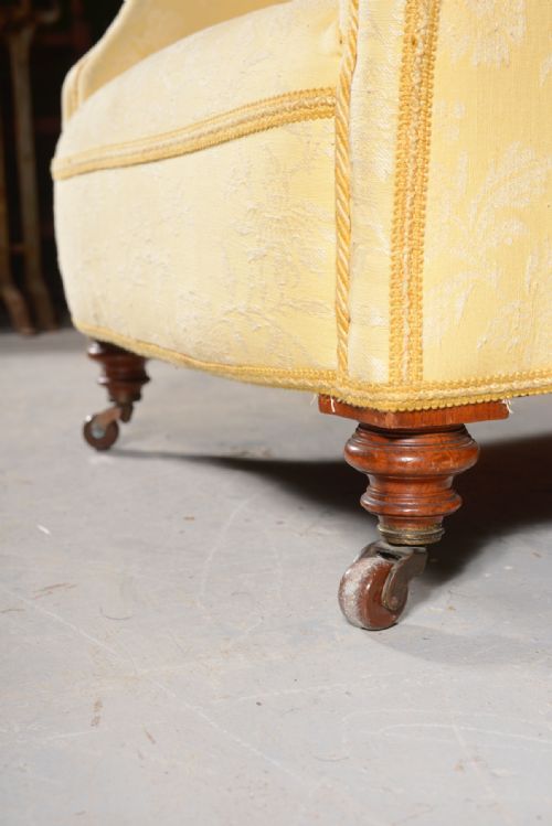 A HOWARD SONS 'WOODSTOCK' STYLE BUTTON BACK ARMCHAIR C1890 - ADDITIONAL PHOTO 4