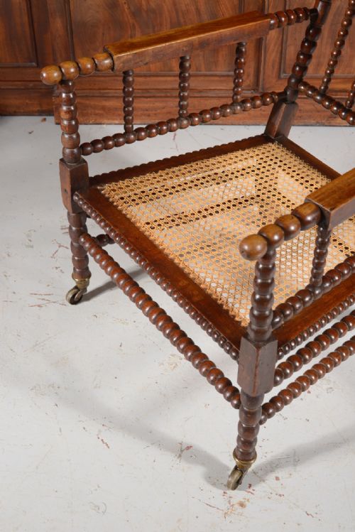 A GEORGE IV SIMULATED ROSEWOOD BOBBIN ARMCHAIR C1840 - ADDITIONAL PHOTO 5