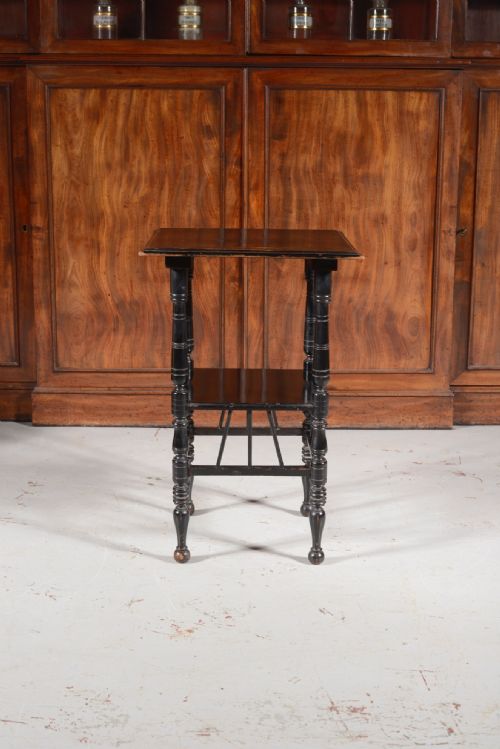 AN AESTHETIC MOVEMENT EBONISED TWO TIER OCCASIONAL TABLE TO A DESIGN BY EW GODWIN C1870 - ADDITIONAL PHOTO 2