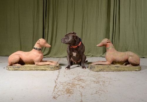 A PAIR OF WEATHERED RECONSTITUTED STONE WHIPPETS IN ORIGINAL PAINT C1930 - ADDITIONAL PHOTO 1