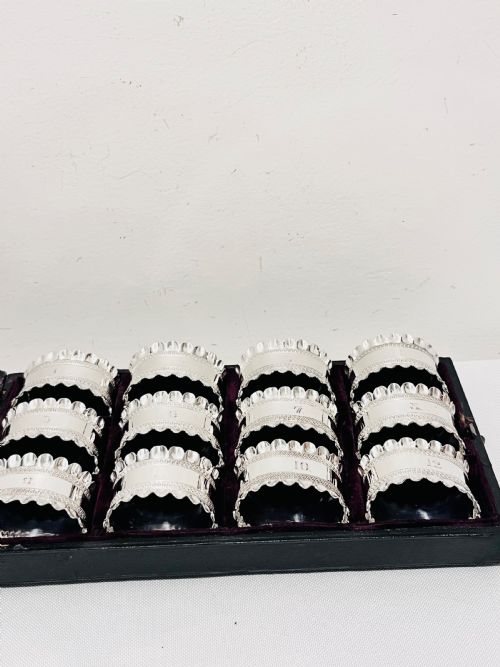 SET OF 12 BOXED ANTIQUE SILVER PLATED NAPKIN RINGS C1900 - ADDITIONAL PHOTO 2
