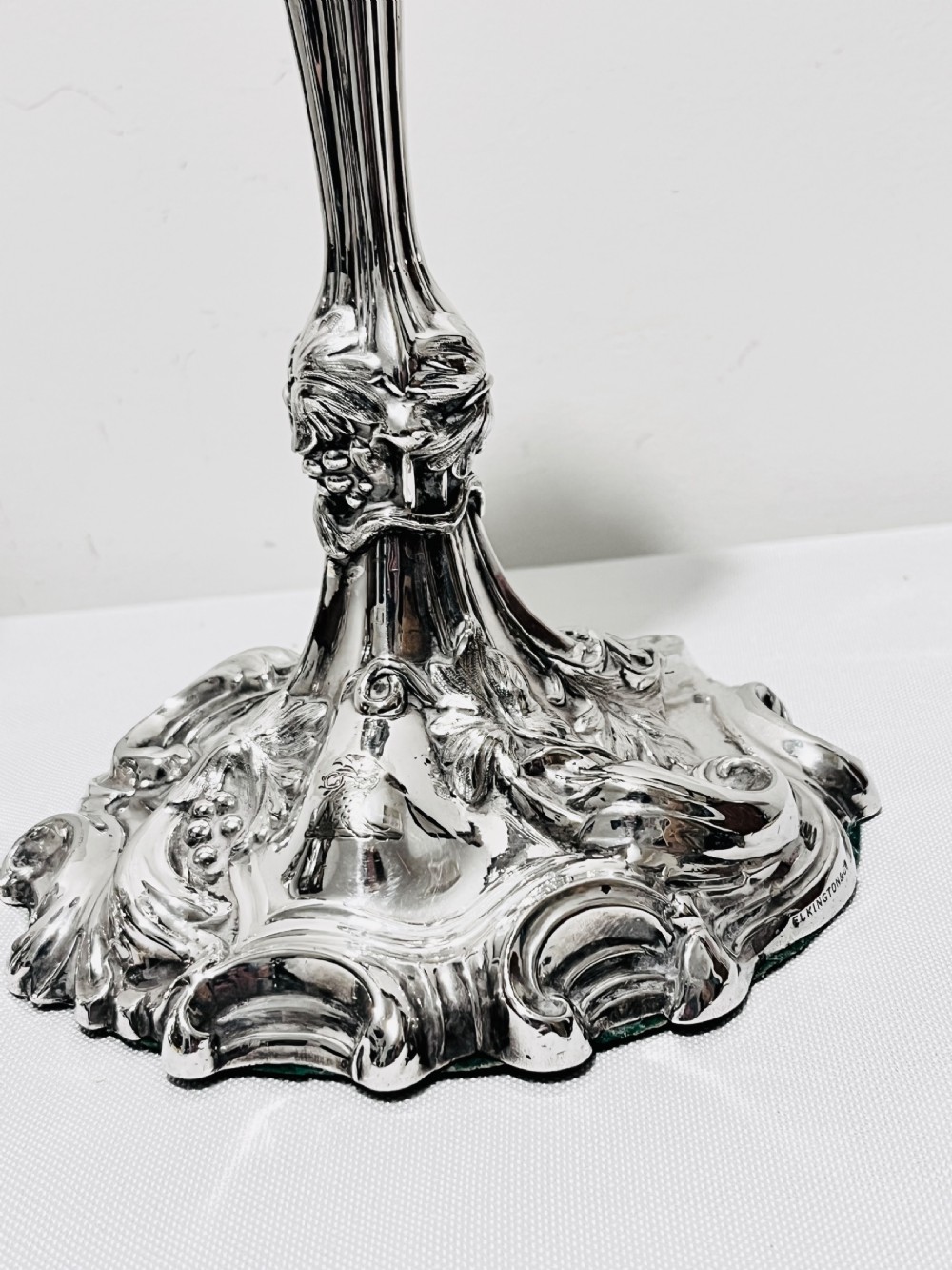Pair of antique silver plated candlesticks by Elkington & Company View II