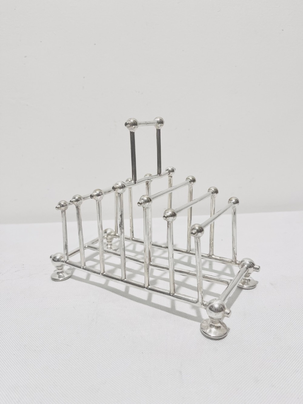 Antique silver plated geometric toast rack by William Hutton & Son c1890