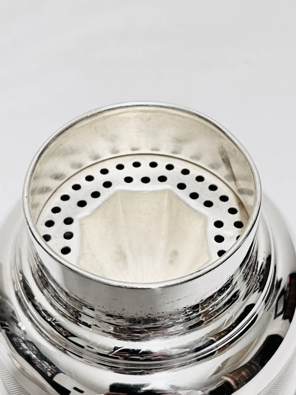 Engine turned silver plated cocktail shaker  with lemon squeezer c1940 View V