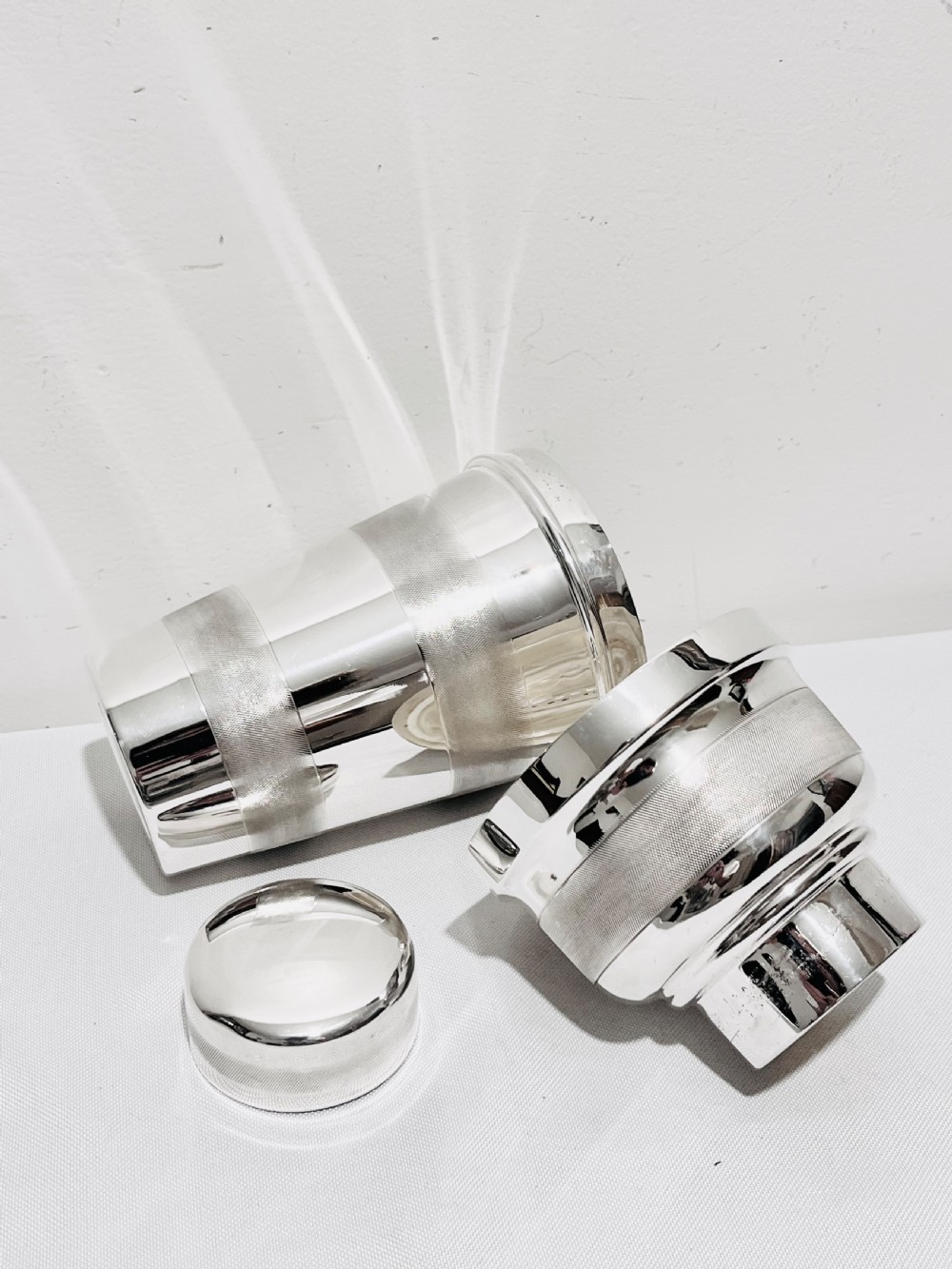 Engine turned silver plated cocktail shaker  with lemon squeezer c1940 View VI