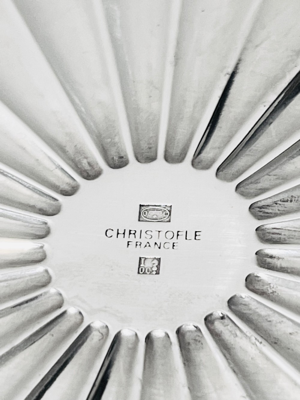 A pair of circular French silver-plated wine coasters featuring fluted central wells and detailed outer rims. View III
