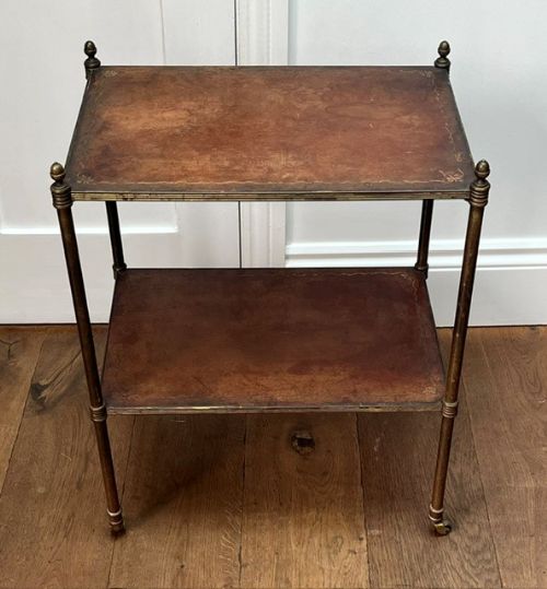 Exceptional lacquered brass and tooled leather two-tier occasional table or etagere, in the manner of Mallett of London