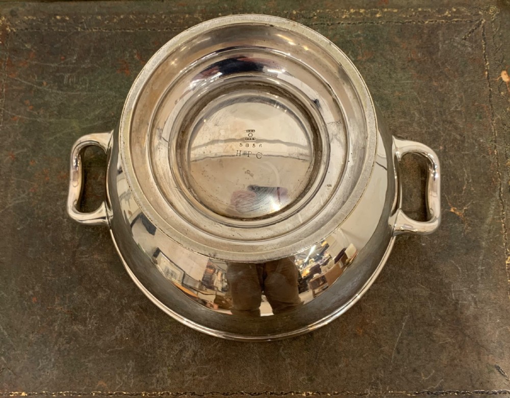 A Victorian silver-plated two-handled soup tureen featuring a domed lid, spherical finial, matching ladle, and pedestal base. View VIII