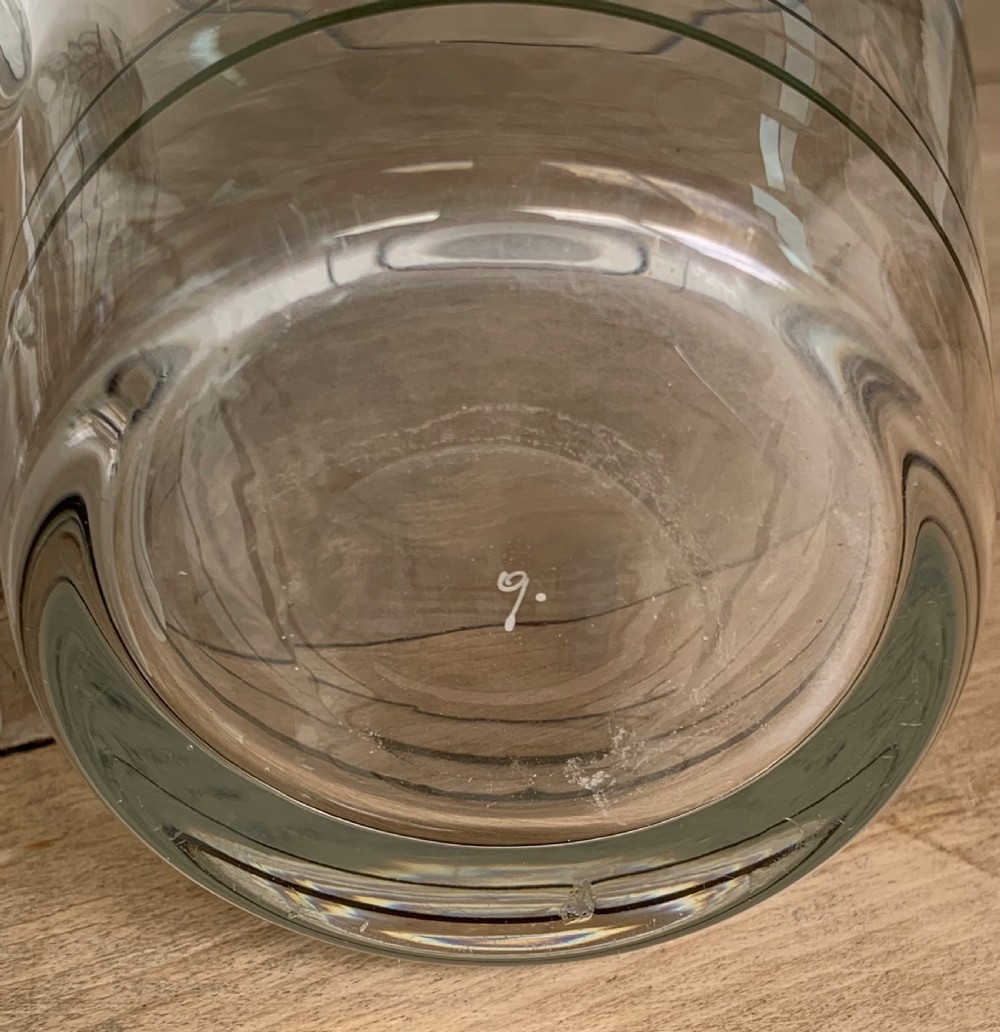 A clear glass Art Deco cocktail shaker featuring a ground glass neck, silver painted lines, and a hand-painted white cockerel motif with a red comb. View XI