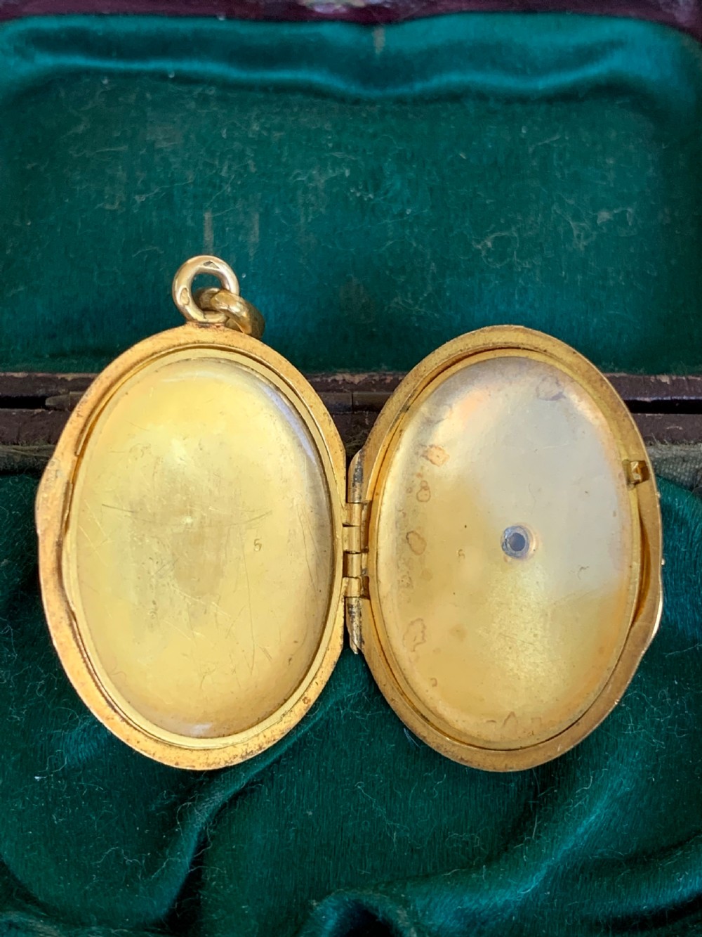 An oval 18ct yellow gold antique photo locket decorated with beaded granulation and a central turquoise and pearl target cluster. View IX