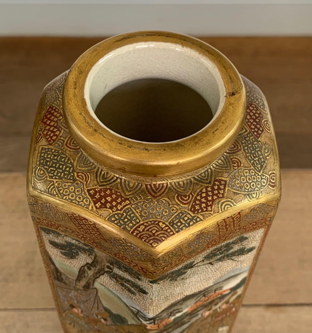 A tall hexagonal Japanese Satsuma ceramic vase with crackle glaze, depicting detailed painted figures in traditional robes and gilded geometric borders. View VIII