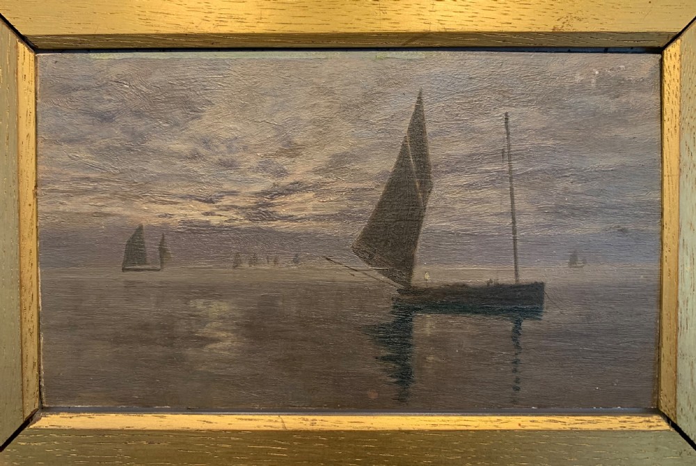 A 19th-century oil painting on board depicting sailing vessels on calm waters under an overcast sky, framed in a wide gilt frame. View III