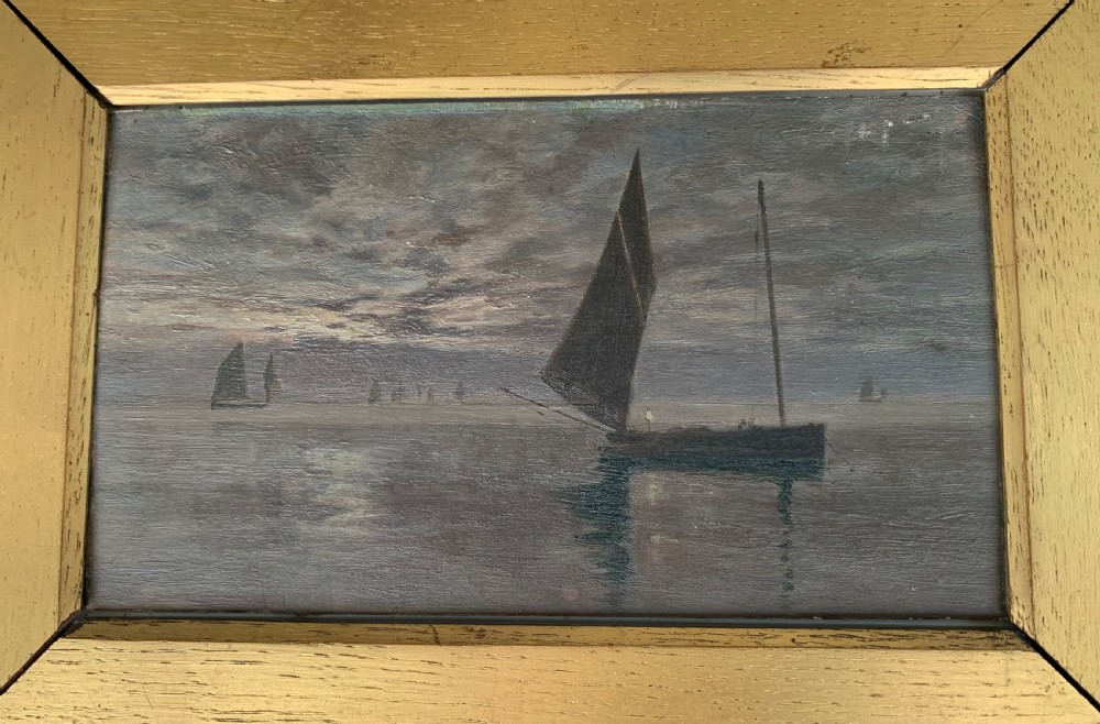 A 19th-century oil painting on board depicting sailing vessels on calm waters under an overcast sky, framed in a wide gilt frame. View VI