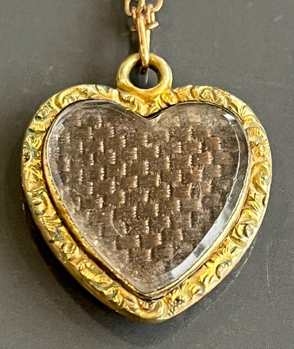 Charming Antique Yellow Metal Heart Shaped Hair Locket Pendant and Chain