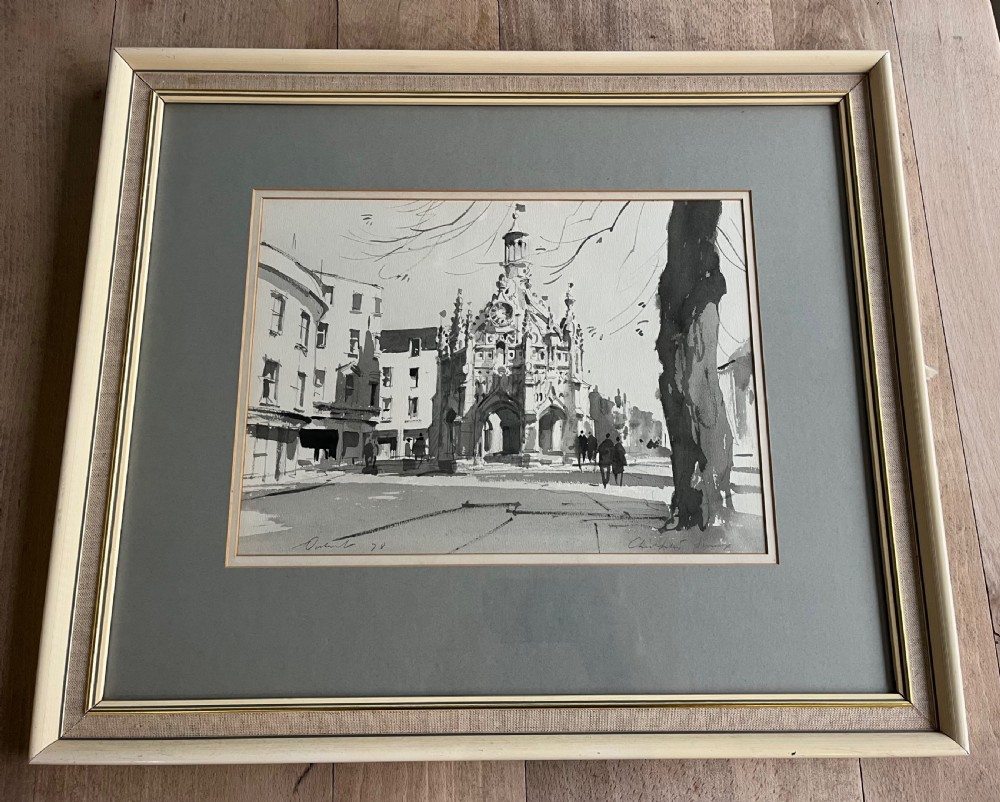 A framed monochrome watercolour painting depicting the historic Market Cross and surrounding buildings in Chichester, Sussex, signed by Stanley Orchart.