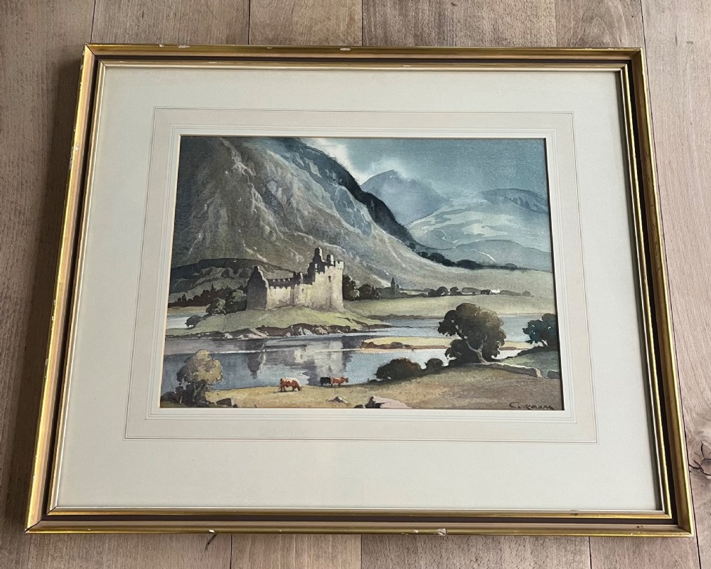 A framed watercolour painting by Emerson H. Groom depicting Kilchurn Castle on the banks of Loch Awe set against a backdrop of mountains. View IV