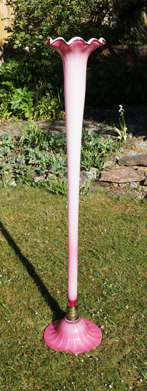 A VERY TALL PINK WHITE CASED GLASS LILY VASE LONDON C1890