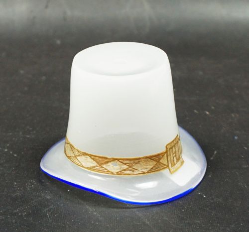 A WHITE OPALINE GLASS HAT WITH BLUE CANE RIM AND GILT BAND FRENCH C1850