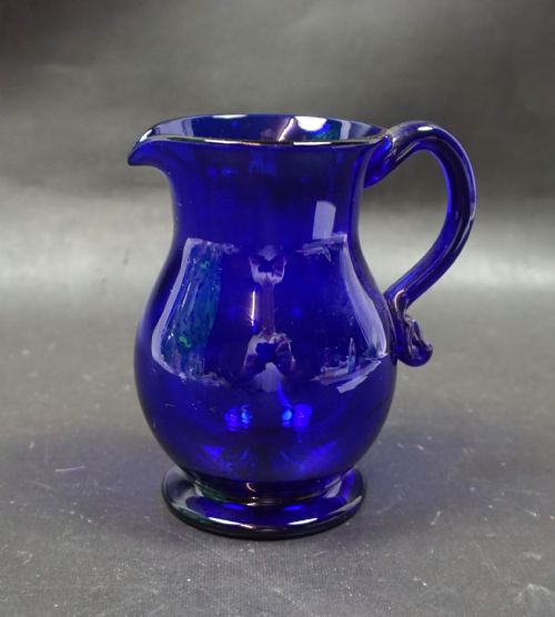 A SMALL 'BRISTOL' BLUE CRAM JUG C1810