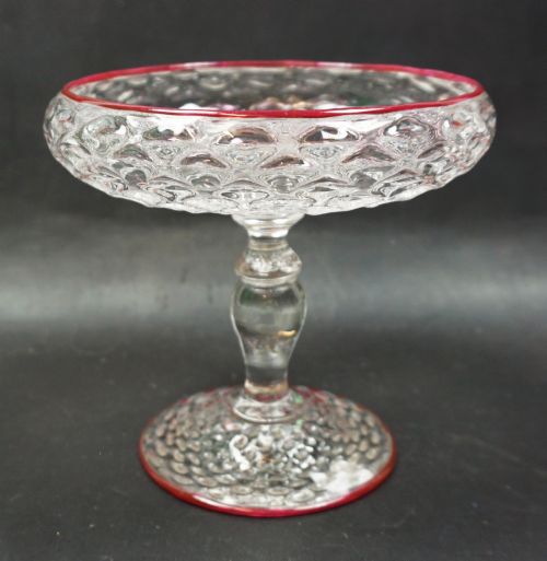 A Honeycomb Moulded Crystal Glass Tazza with Red Cane Decoration, English C.1880