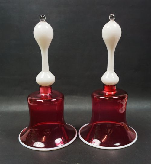 A Pair of Cranberry Glass Bells with White Glass Handles and Rim, English C.1880