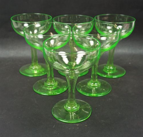 A Set of Six Uranium Green Hollow Stem Champagne Coupes, English C.1930
