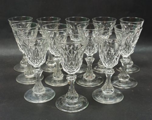 A Set of Twelve Small Wine Glasses with Facet Cut Stems and Bowls, English C.1860
