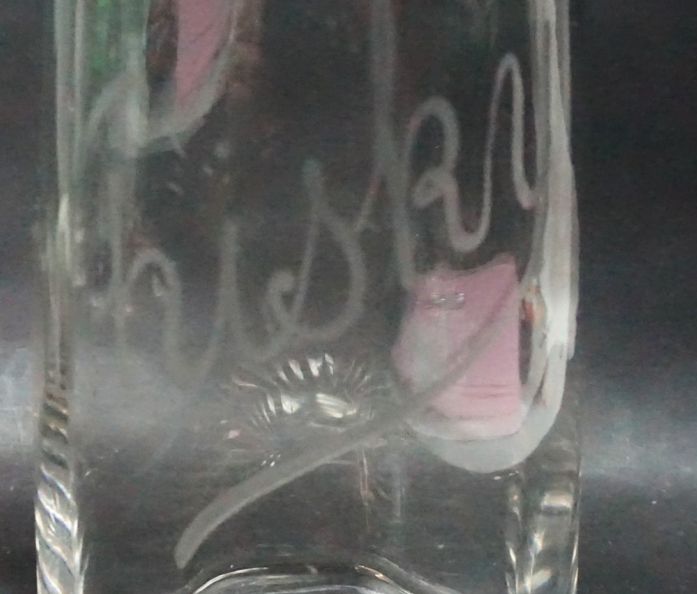 A pair of clear optically blown crystal glass decanters with teardrop stoppers engraved with Brandy and Whisky. View III