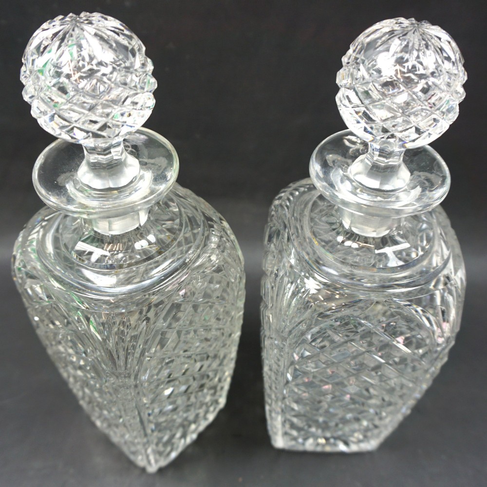 A pair of crystal glass square section tapered decanters, English c.1910 View II