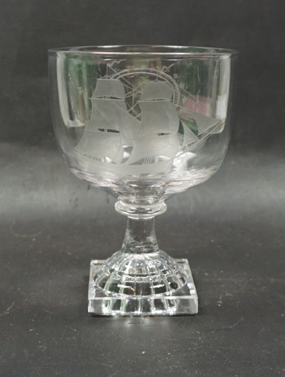 A square lemon squeezer based rummer engraved with a sailing ship, English c.1790