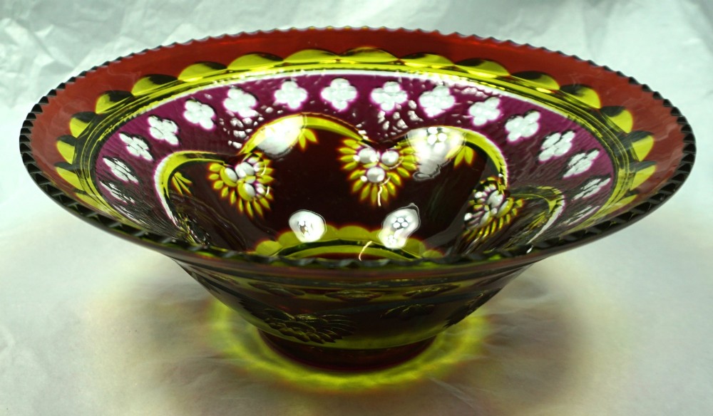 An Art Deco Val Saint Lambert multi-coloured cased glass bowl with intricate geometric cut crystal detailing viewed from above. View II