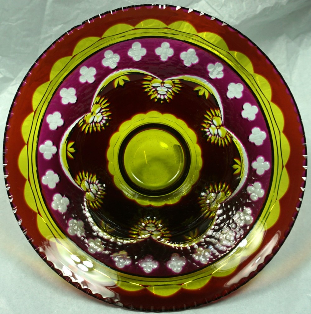 An Art Deco Val Saint Lambert multi-coloured cased glass bowl with intricate geometric cut crystal detailing viewed from above. View III