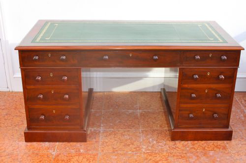 an early victorian curl mahogany nine drawer pedestal desk - CATEGORY: ANTIQUE DESKS - DATED 1860