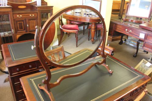 a late 19th early 20th century mahogany oval dressing table mirror - CATEGORY: ANTIQUE MIRRORS - DATED 1900