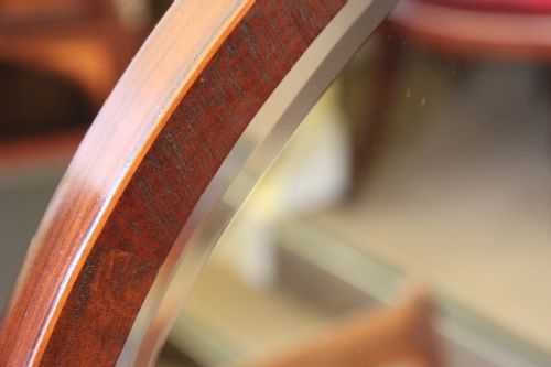 A LATE 19TH EARLY 20TH CENTURY MAHOGANY OVAL DRESSING TABLE MIRROR - ADDITIONAL PHOTO 1