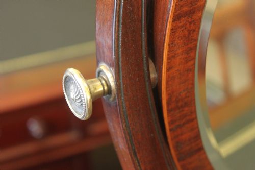 A LATE 19TH EARLY 20TH CENTURY MAHOGANY OVAL DRESSING TABLE MIRROR - ADDITIONAL PHOTO 2