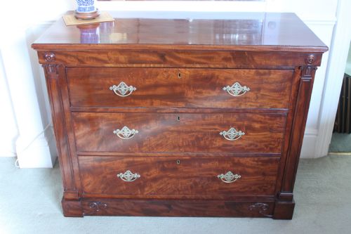 an early 19th century empire style mahogany chest of drawers - CATEGORY: ANTIQUE CHEST OF DRAWERS - DATED 19TH CENTURY
