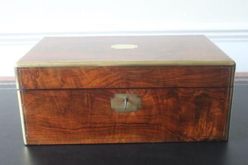 a victorian figured walnut writing slope with secret drawers - CATEGORY: ANTIQUE BOXES - DATED VICTORIAN